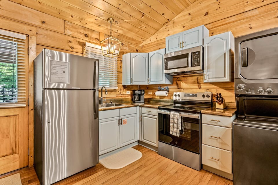 In this kitchen, everything you will need is provided except for a dishwasher. Here we do dishes by hand together or go out to eat!