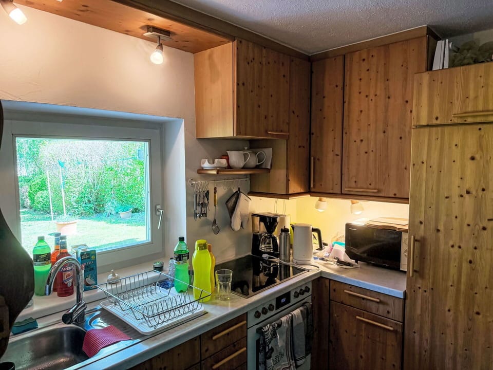 Kitchen, Countertop, Kitchen Appliance, Interior Design, Cabinetry, Furniture, Wood, Major Appliance, Flooring, Room