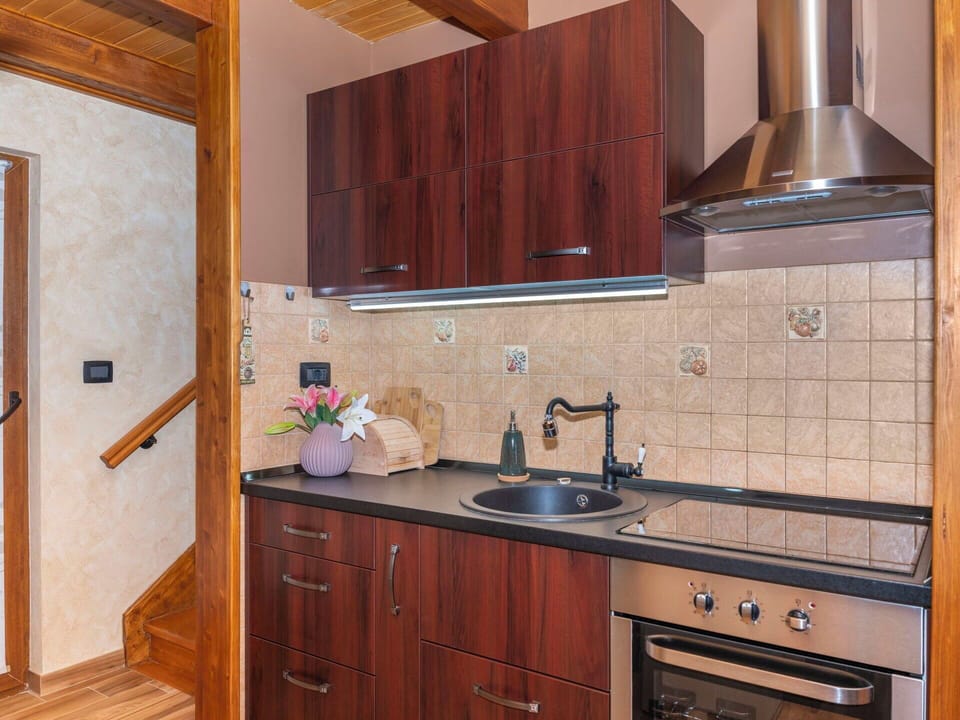Countertop, Kitchen, Flooring, Wood, Kitchen Appliance, Cabinetry, Interior Design, Furniture, Major Appliance, Floor