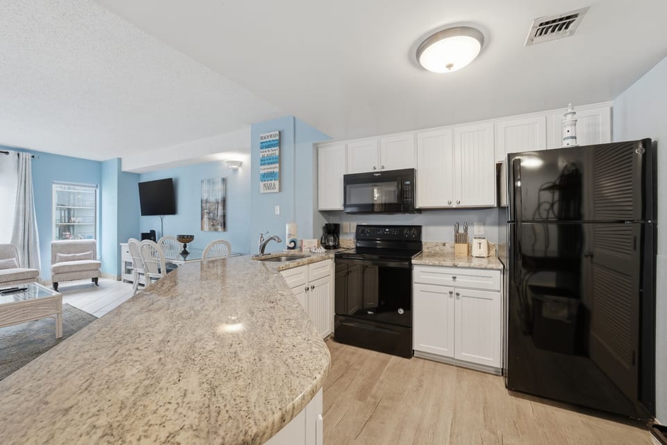 Condo, 2 Bedrooms | Private kitchen | Fridge, oven, coffee/tea maker, toaster