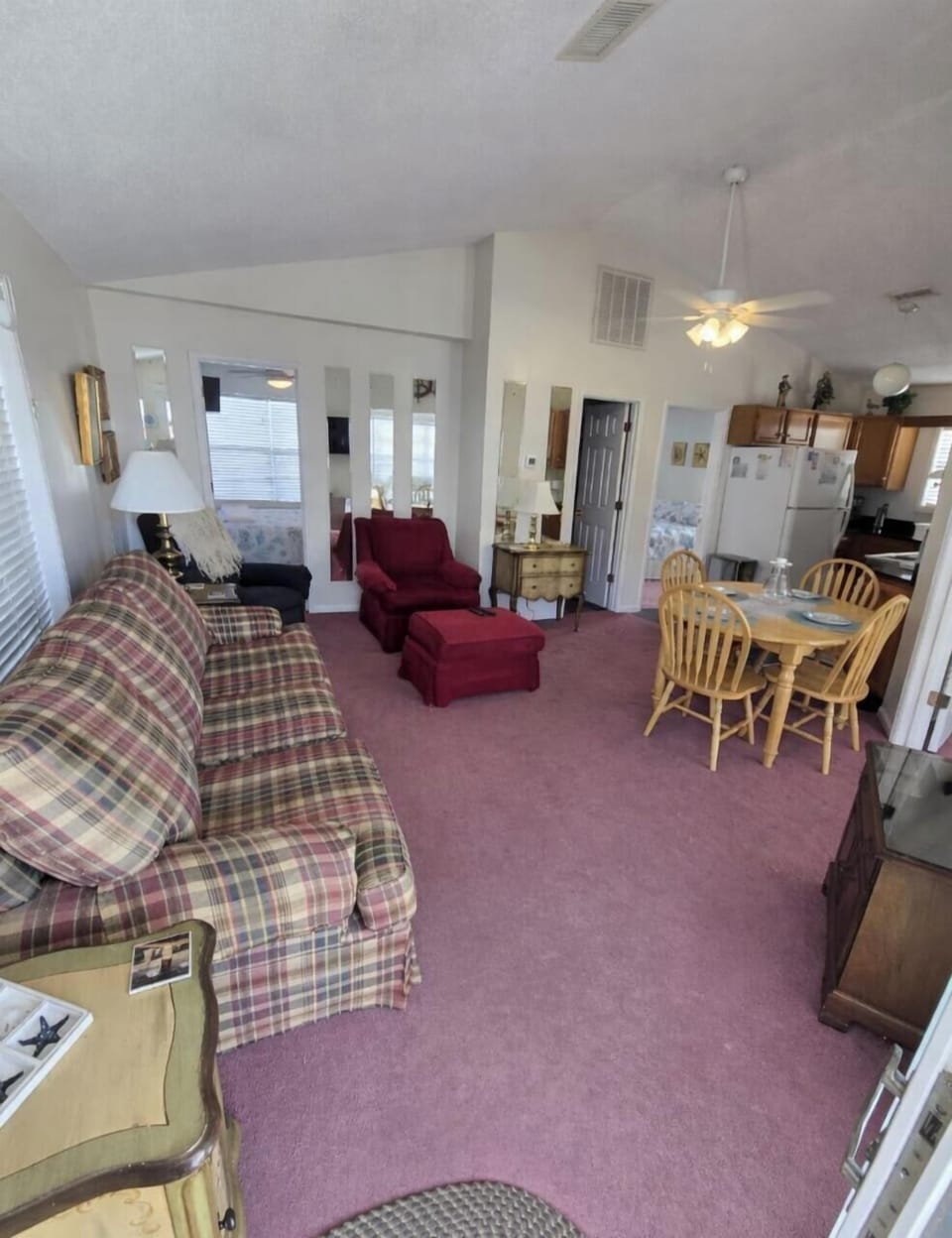  climate control, couch, living area, dining table , (chairs to be replaced)