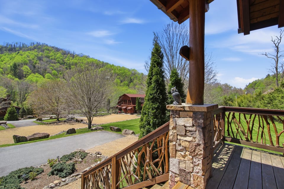 Rustic deck with mountain views and landscaped grounds—peaceful retreat