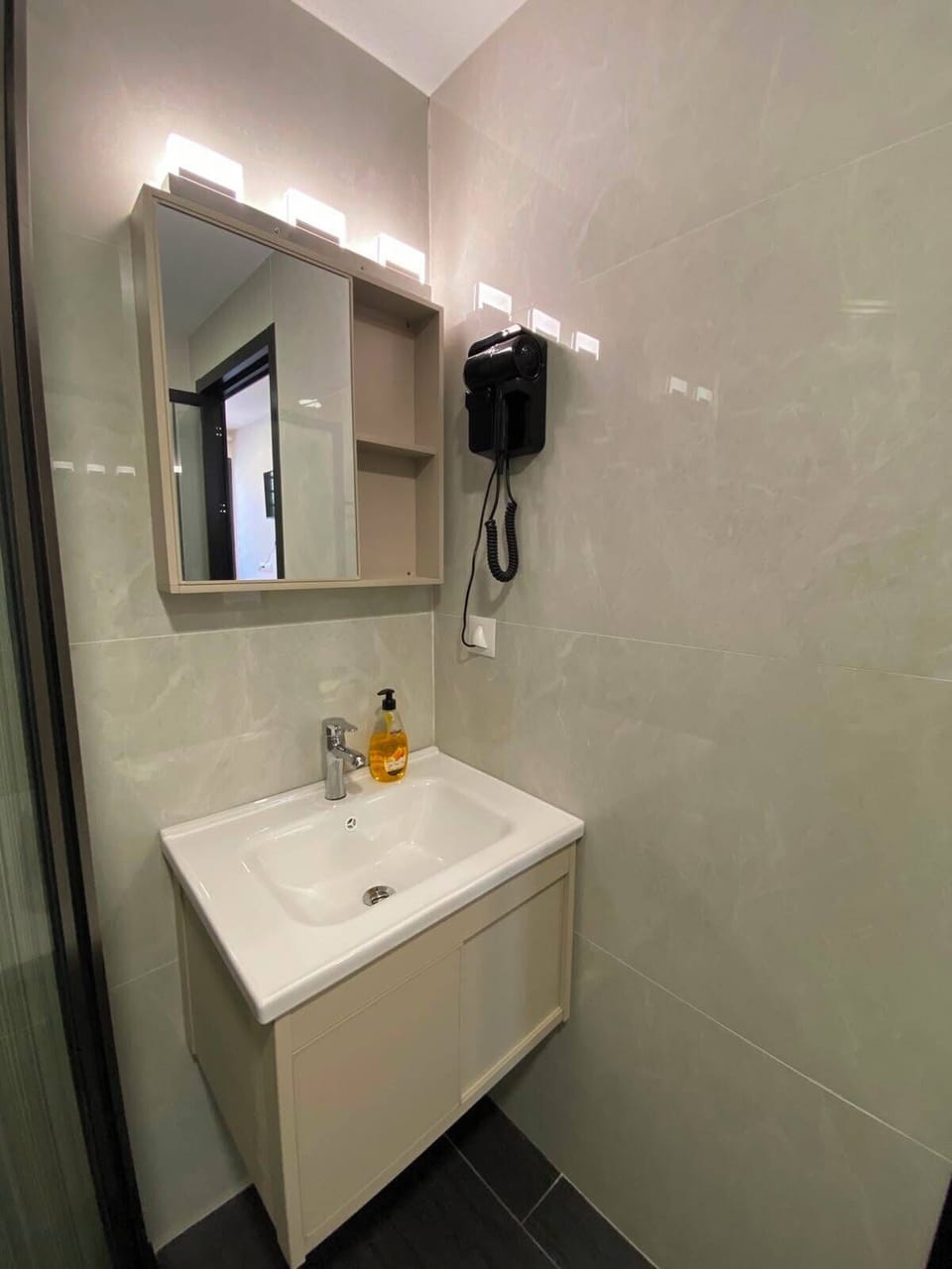 Shower, rainfall showerhead, hair dryer, towels