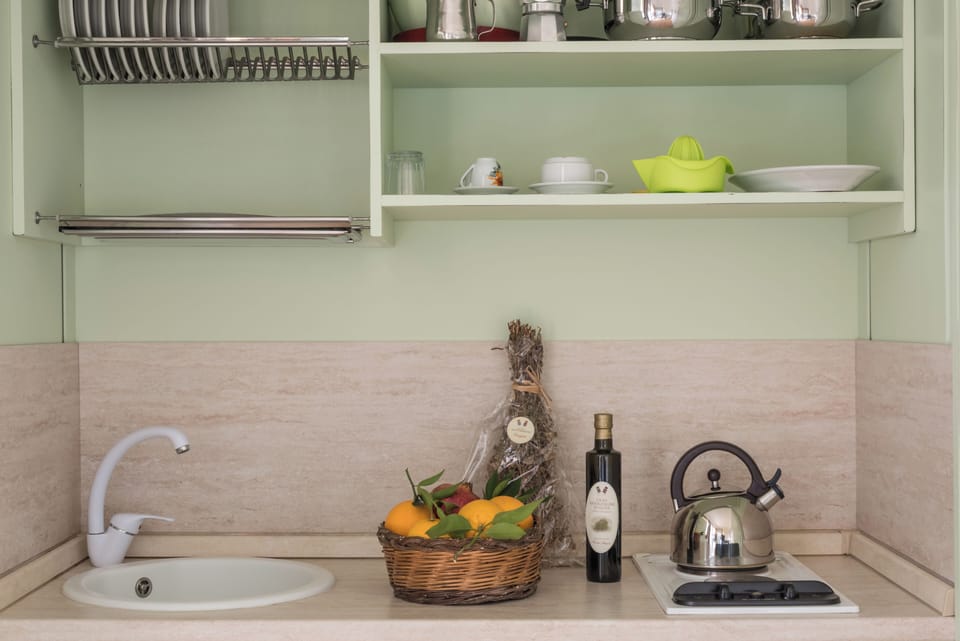 Superior Apartment, Patio, Courtyard View | Private kitchen | Espresso maker, electric kettle