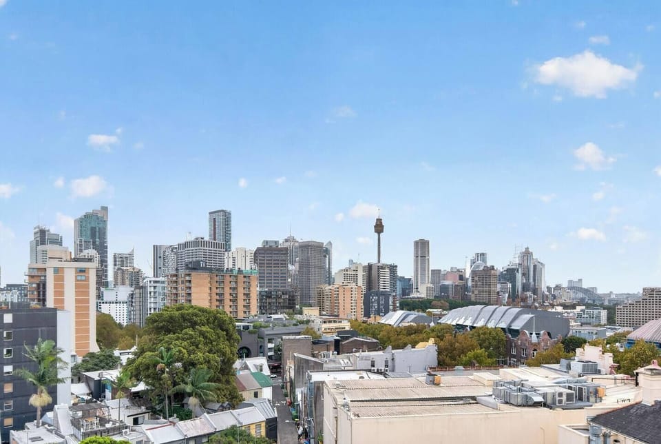 Take in sweeping skyline views from the shared rooftop, offering a calm contrast to Darlinghurst’s lively energy below.