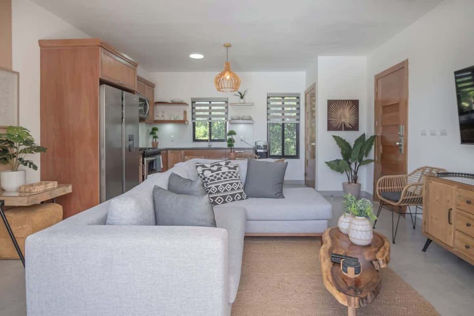 Furniture in the main living room, super comfortable, with a super large TV, a perfect place to have a relaxing time.
