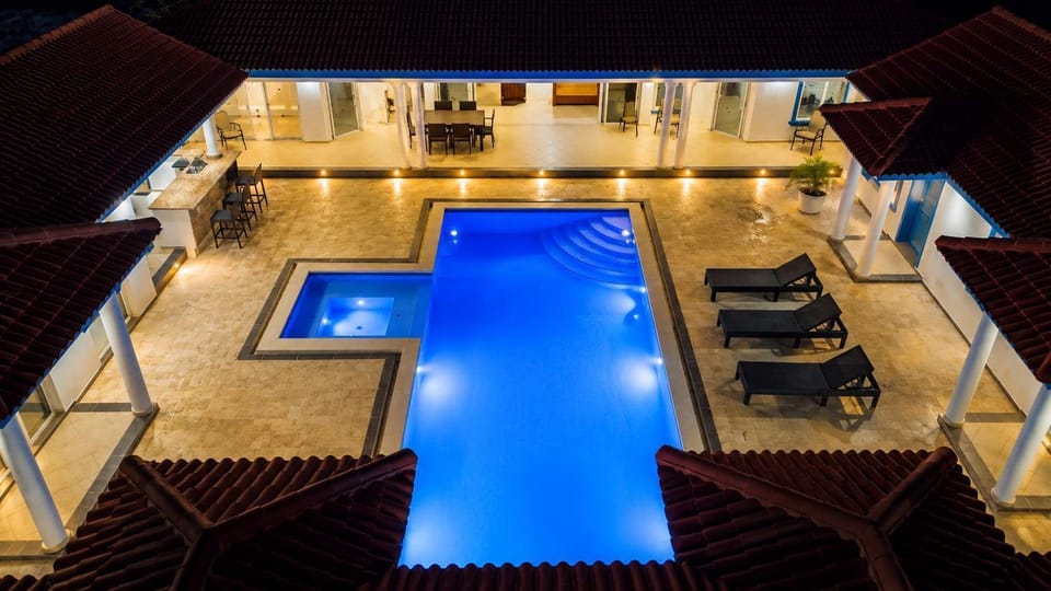 Pool at night — infinity edge