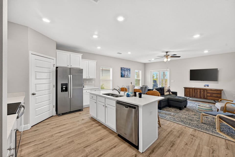 Open concept kitchen, living and dining