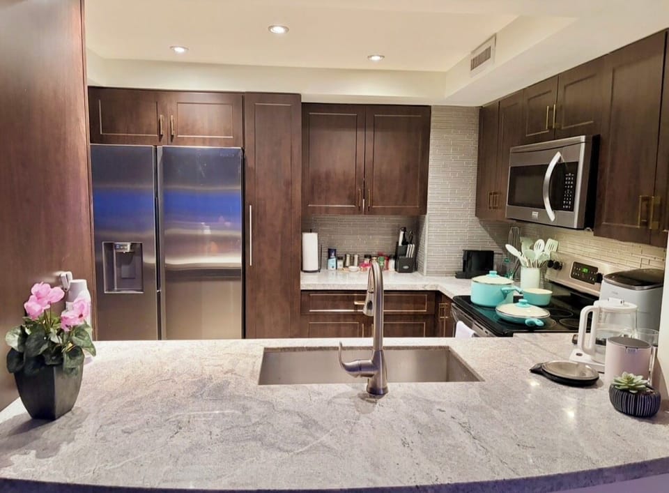 New appliances, a large sink, plenty of storage and counter space for cooking.