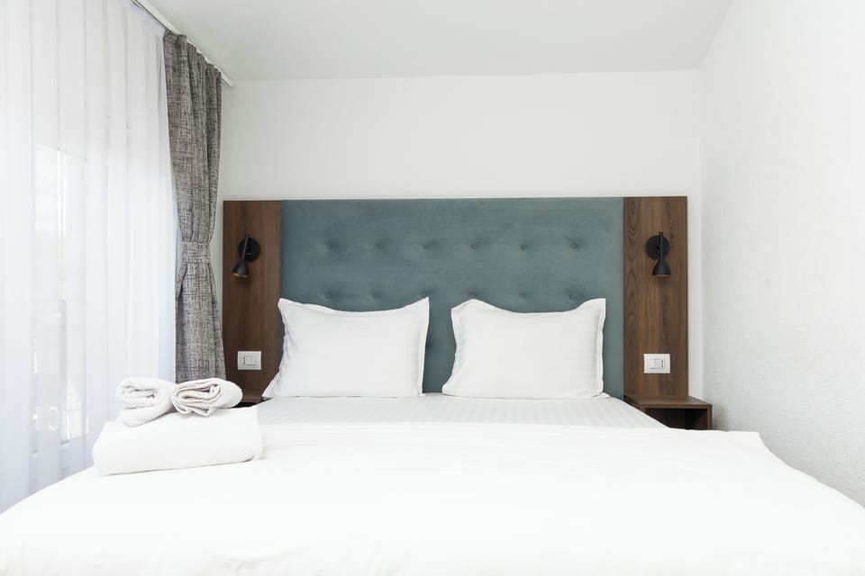 Deluxe Double Room, City View | Desk, laptop workspace, free WiFi