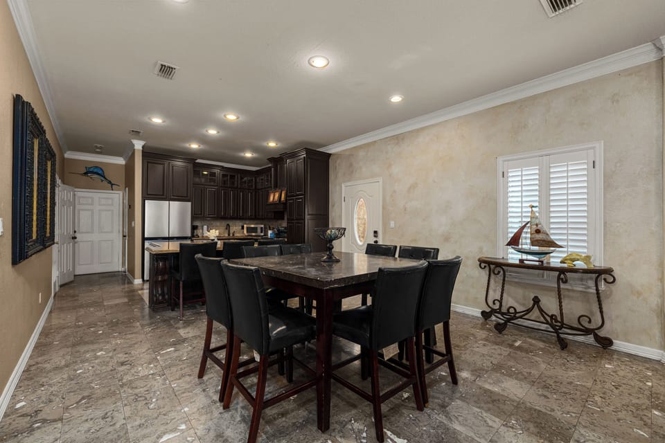 Gather around the table with the kitchen just steps away