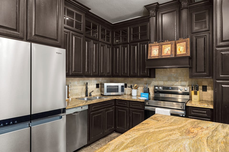 Spacious kitchen with modern appliances and ample counter space