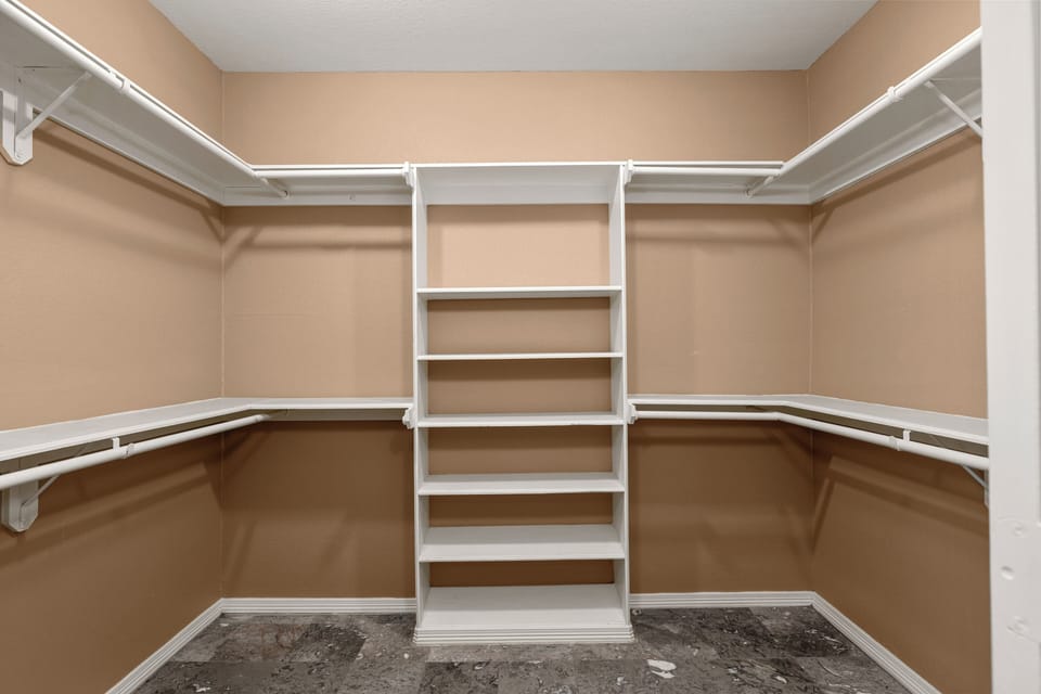 Master suite features a large walk-in closet