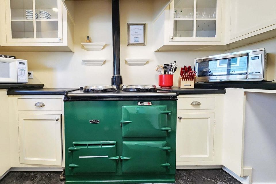 The heart of the kitchen is this classic AGA cooking range
