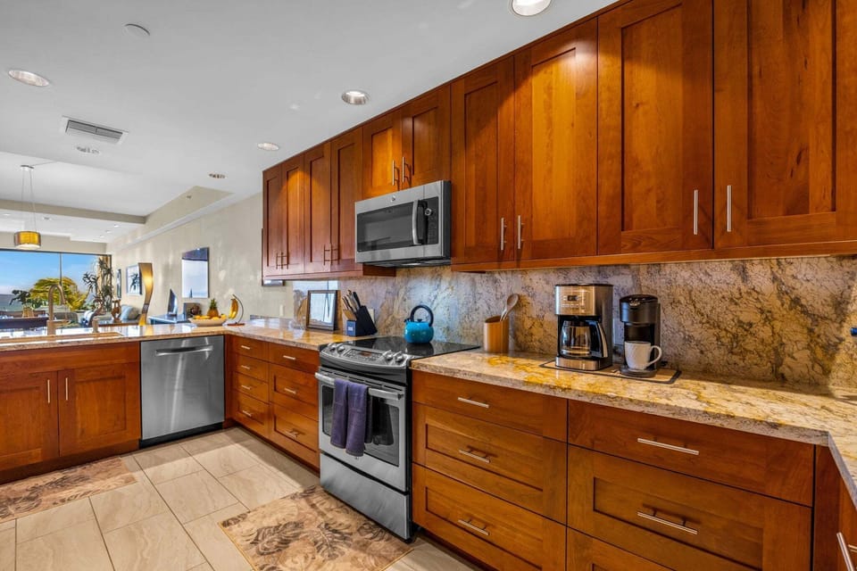 Enjoy a functional kitchen designed for meal prep and entertaining, complete with quality appliances and ample workspace.