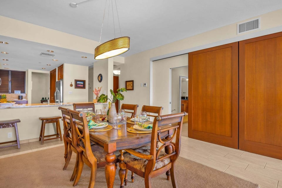 A warm dining area with close access to the kitchen, ideal for serving meals and gatherings.