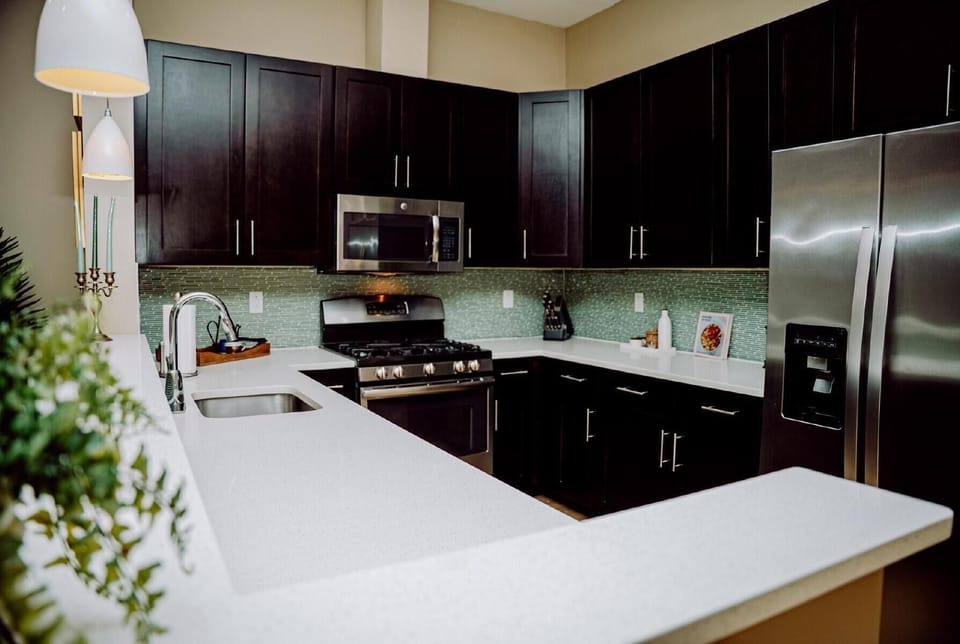 Modern chef’s kitchen with stainless appliances and spacious countertops