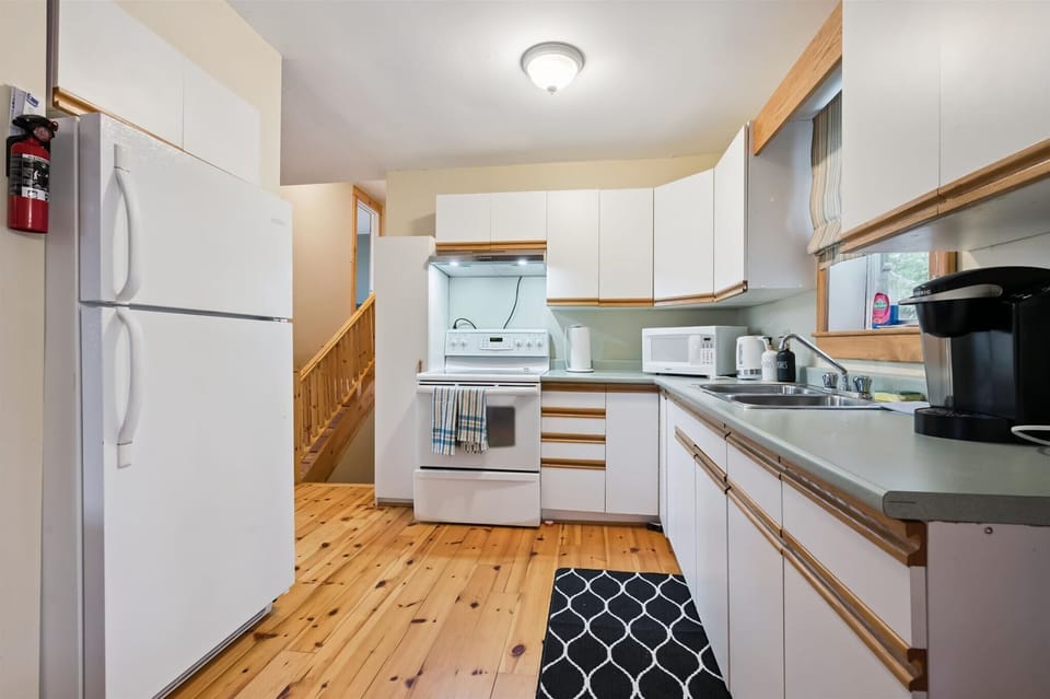 A charming kitchen space with plenty of counter space for prepping meals