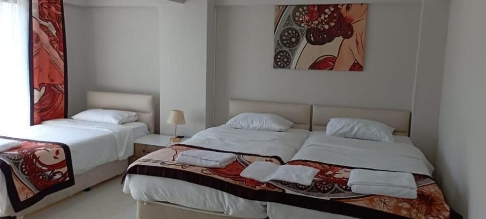 Standard Triple Room | Minibar, in-room safe, free WiFi, bed sheets