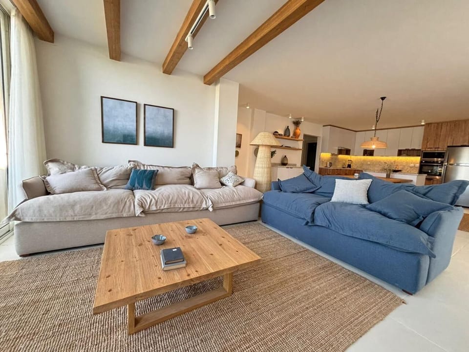 Chalet, 3 Bedrooms, Lagoon View | Living area | Flat-screen TV