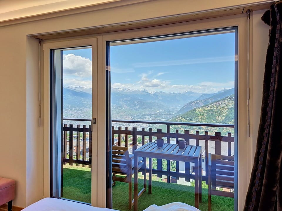 Furniture, Interior Design, Porch, Mountain Range, Balcony, Room, Wood Stain, Hardwood, Bed, Ridge