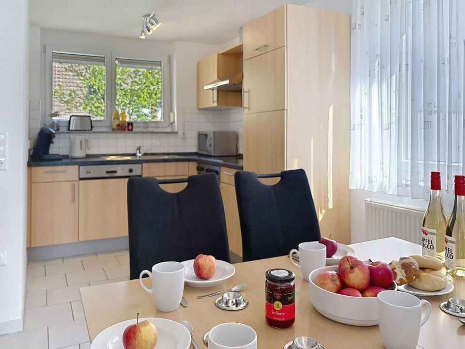 Kitchen, Furniture, Kitchen Appliance, Countertop, Interior Design, Major Appliance, Flooring, Cabinetry, Room, Lighting