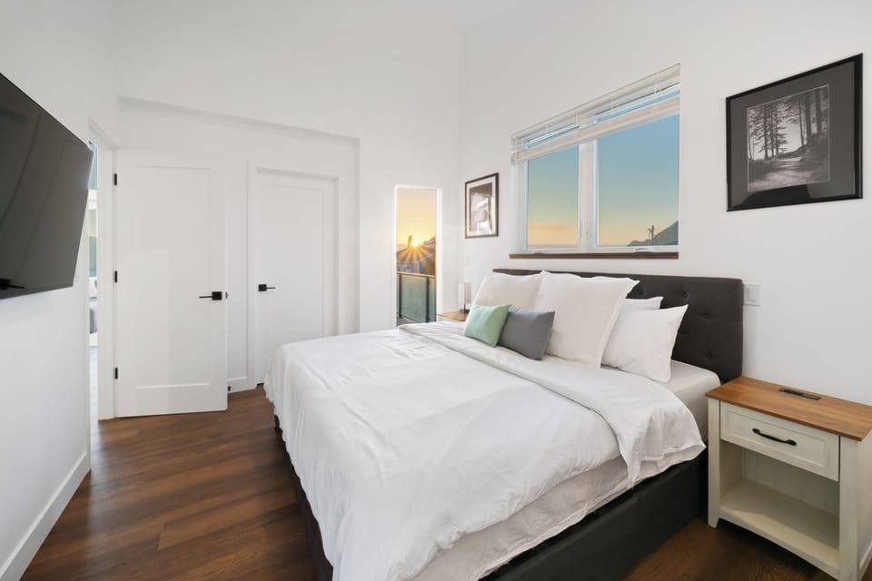 Master bedroom with streaming TV, private bath and access to the deck.