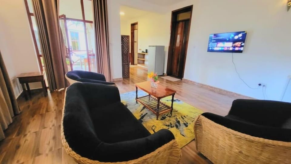 Apartment, Balcony, Pool View | Living area | 43-inch Smart TV with cable channels, table tennis, toys