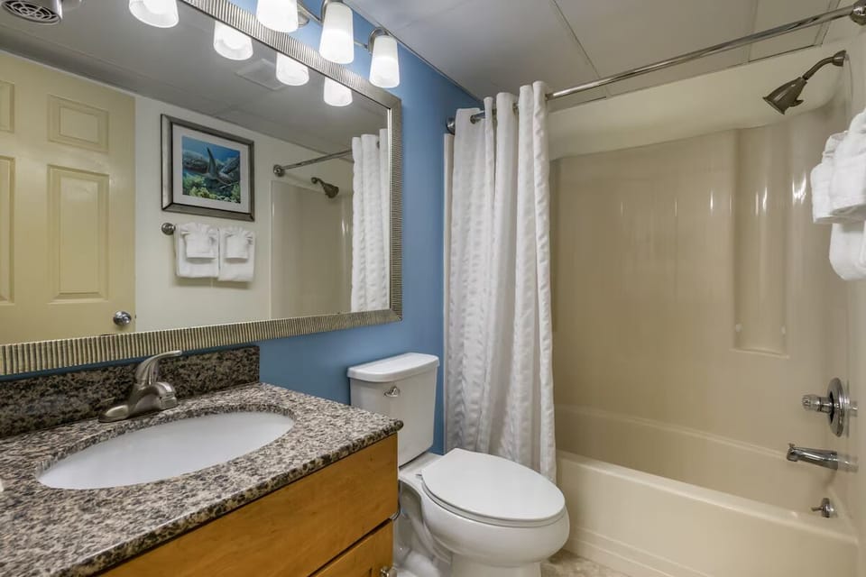Rinse off the sand with an easy, clean tub-shower.