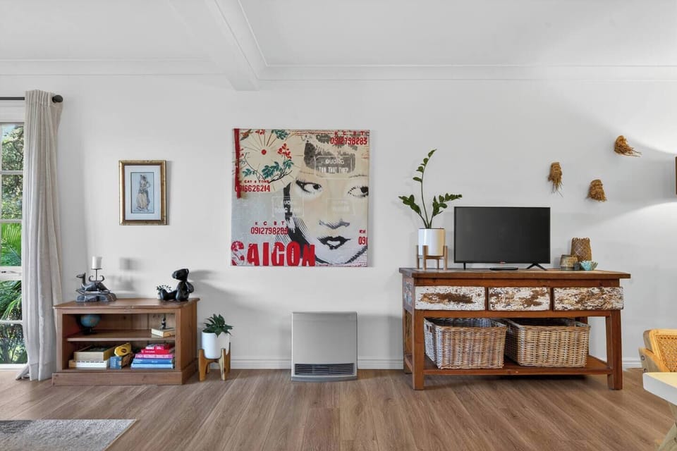 Ease into a relaxed evening, where curated décor and warm textures bring depth and character to the inviting living area.