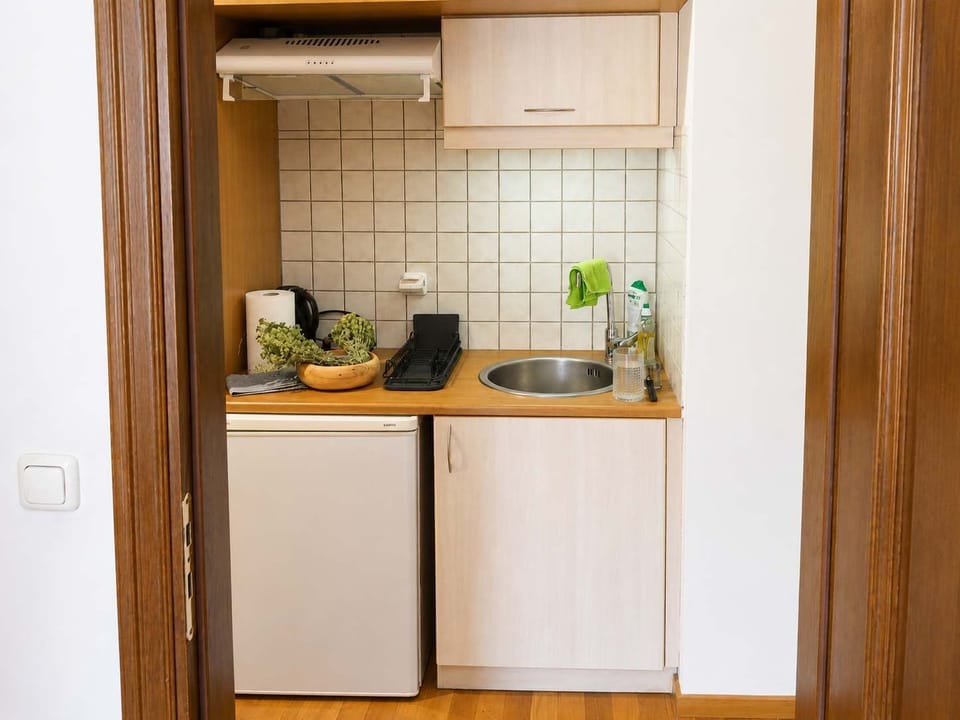 Compact Kitchenette with Sink, Mini Fridge and Storage