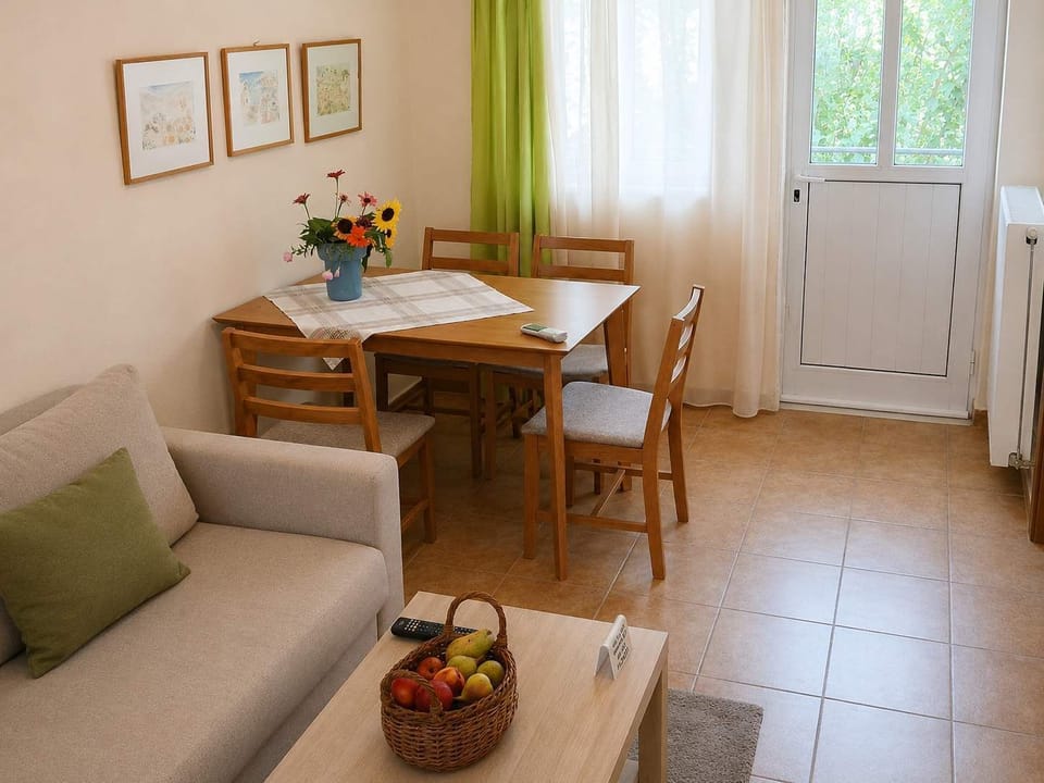 Dining Area with Four-Person Table and Garden Access