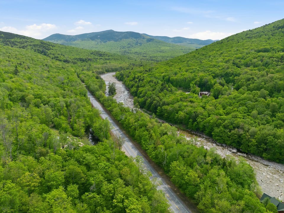 Waking up to these views never gets old. Enjoy sweeping view of the ridgeline and nearby Loon Mountain trails.