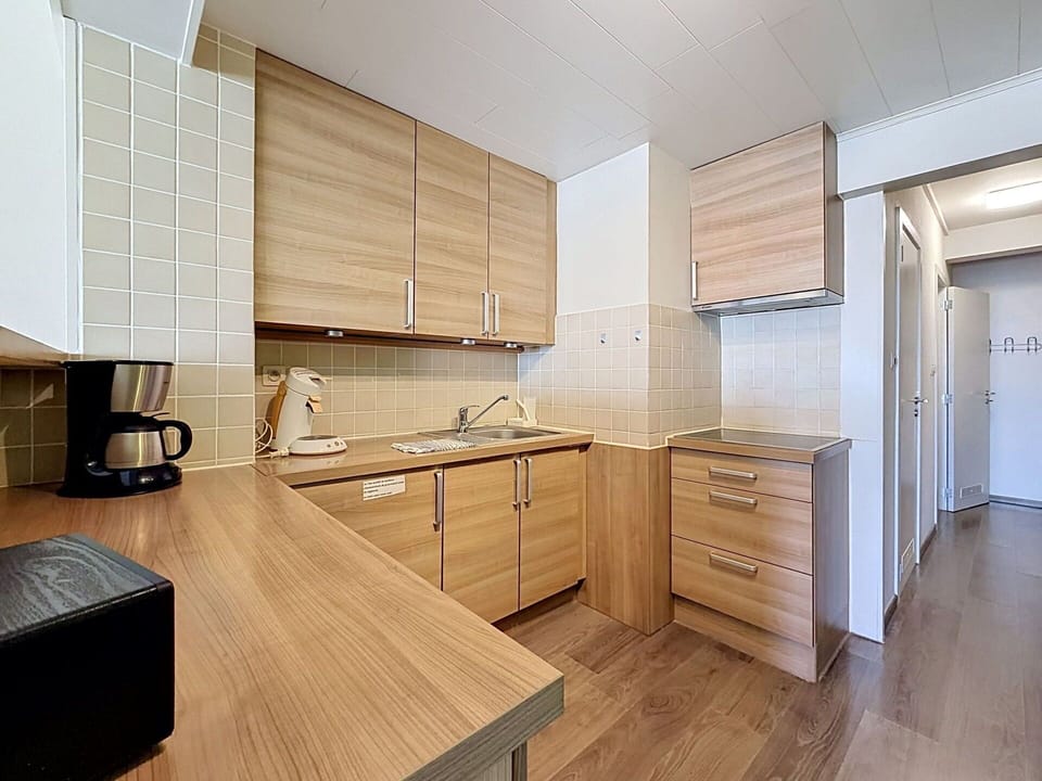 Flooring, Wood, Countertop, Interior Design, Cabinetry, Floor, Kitchen, Furniture, Wood Flooring, Ceiling