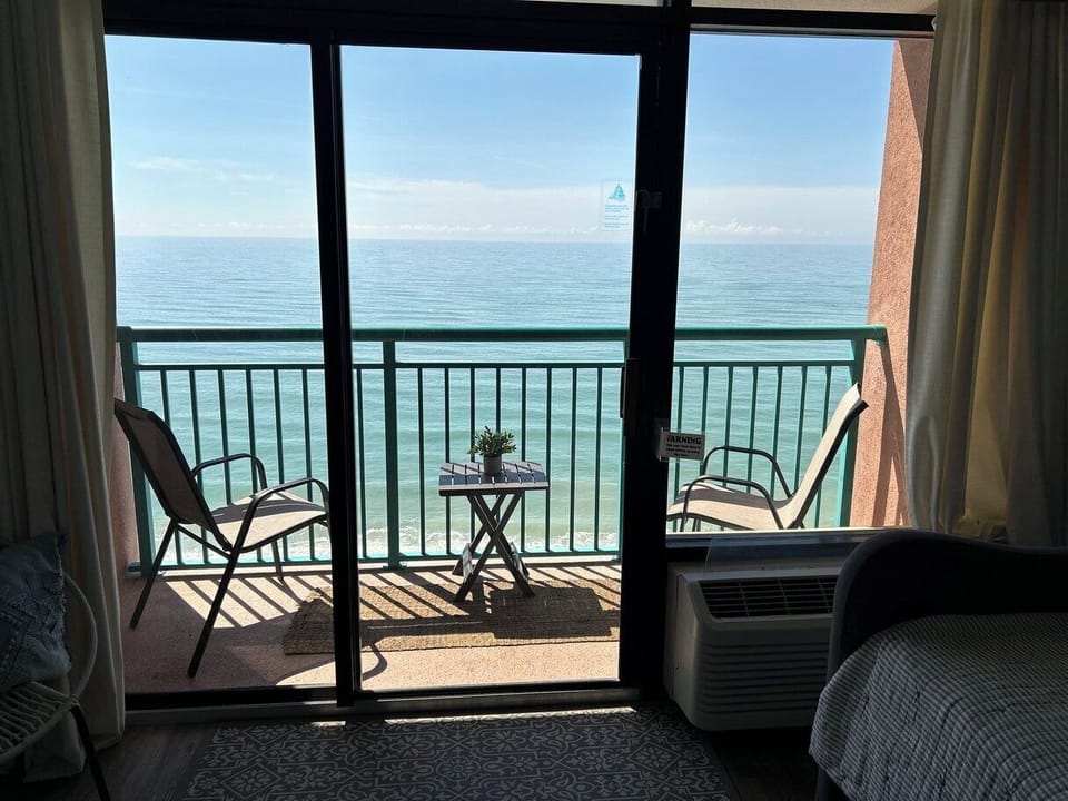 Coffee on this balcony just tastes different
