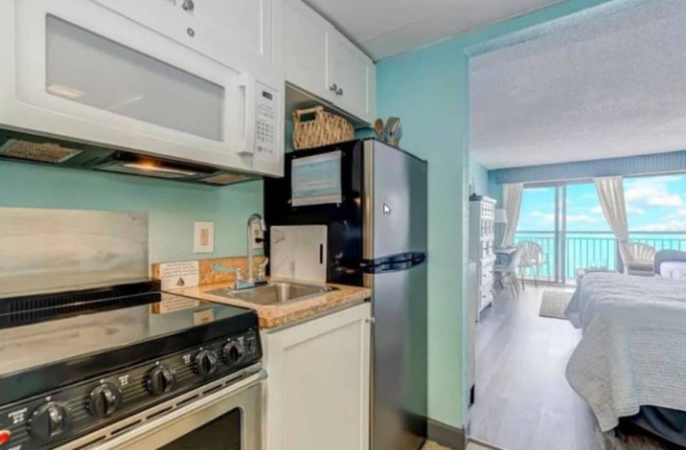 Kitchenette complete with new full size refrigerator