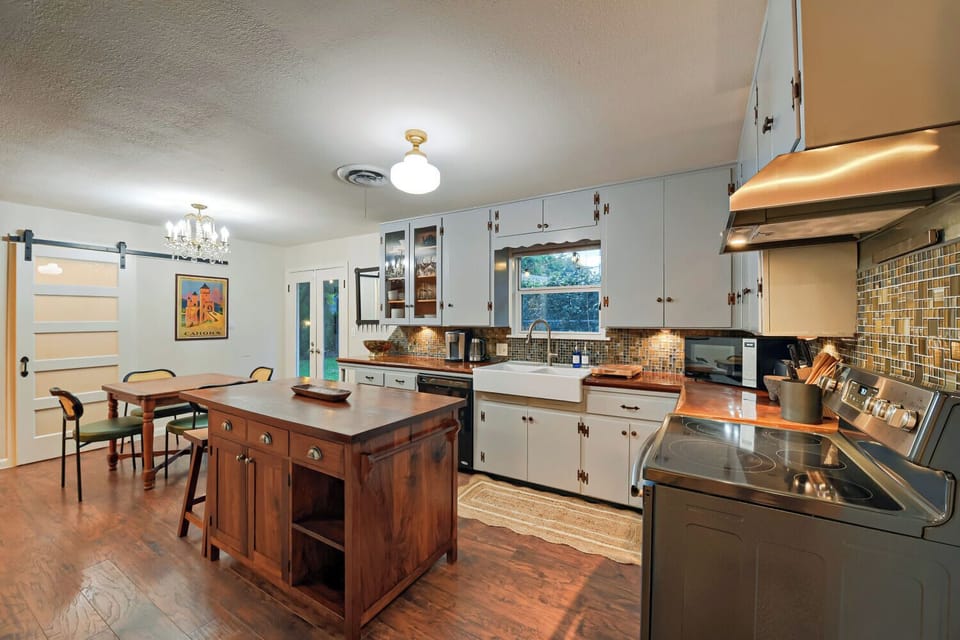 Well-equipped kitchen featuring modern appliances and plenty of prep space