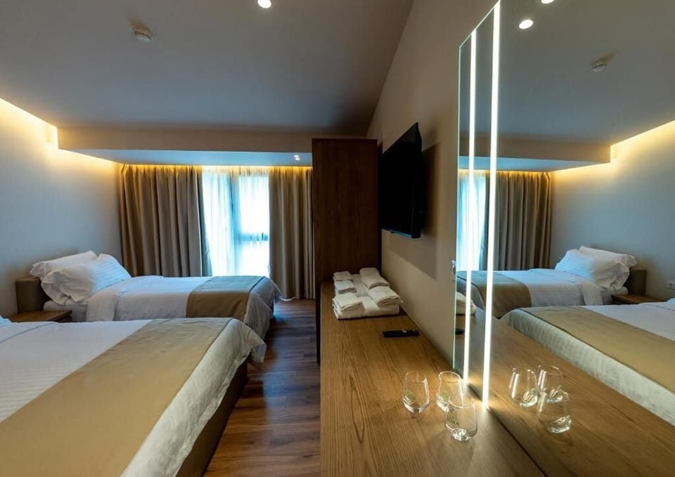 Comfort Triple Room, Balcony, Garden View | In-room safe, desk, soundproofing, free WiFi