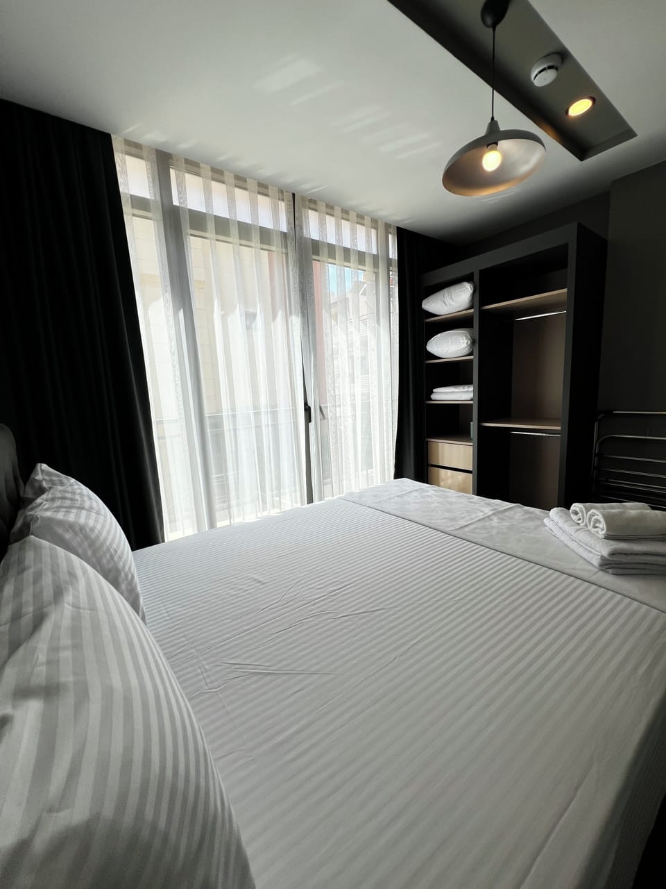 Deluxe Apartment, 1 Queen Bed with Sofa bed, Non Smoking, City View | Desk, laptop workspace, blackout drapes, iron/ironing board