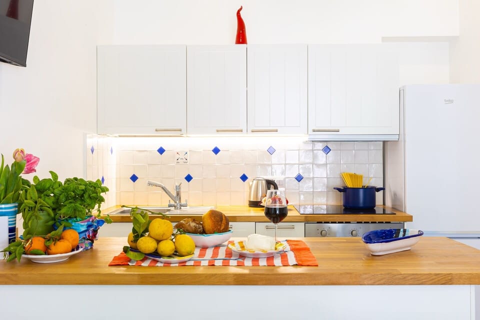 Deluxe Apartment, Sea View | Private kitchen | Fridge, oven, stovetop, dishwasher