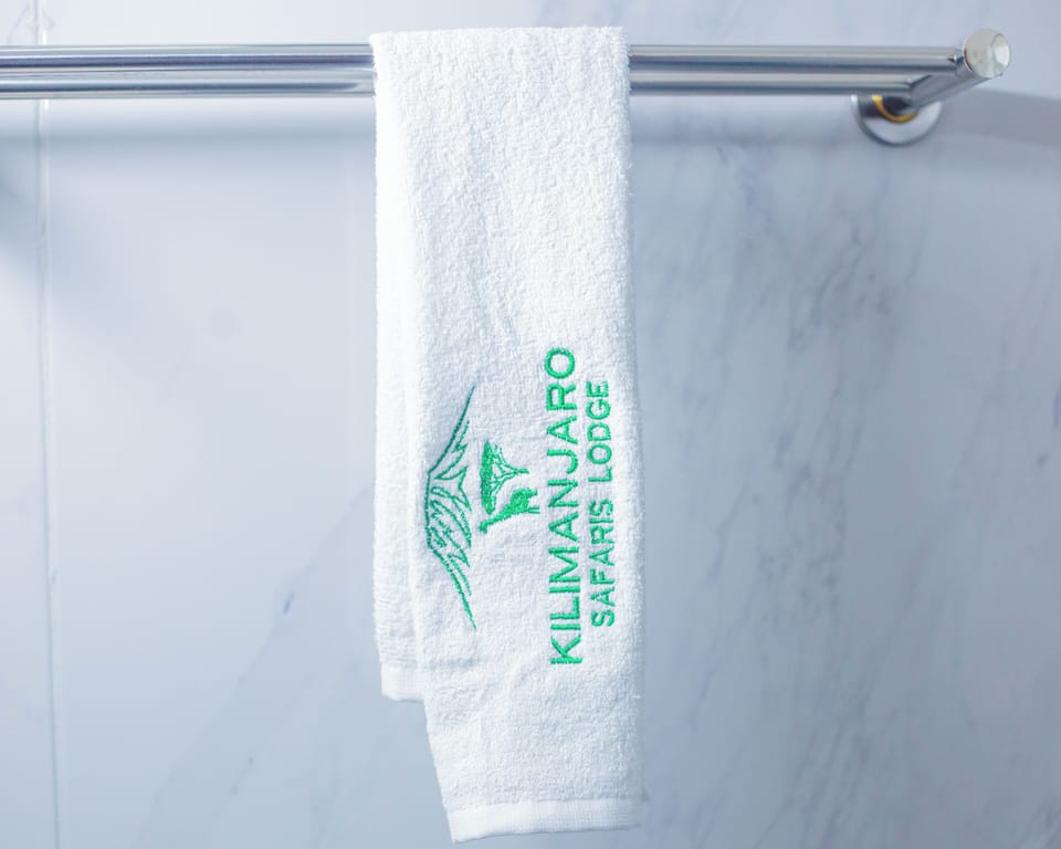 Shower, towels, soap, shampoo