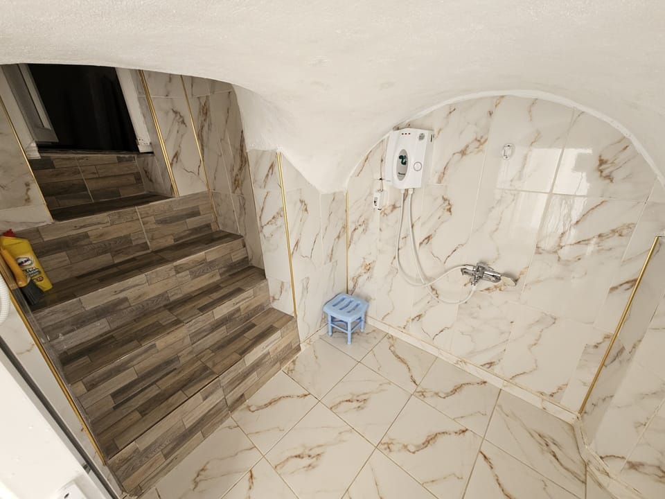 Family Room, Courtyard View | Bathroom | Slippers