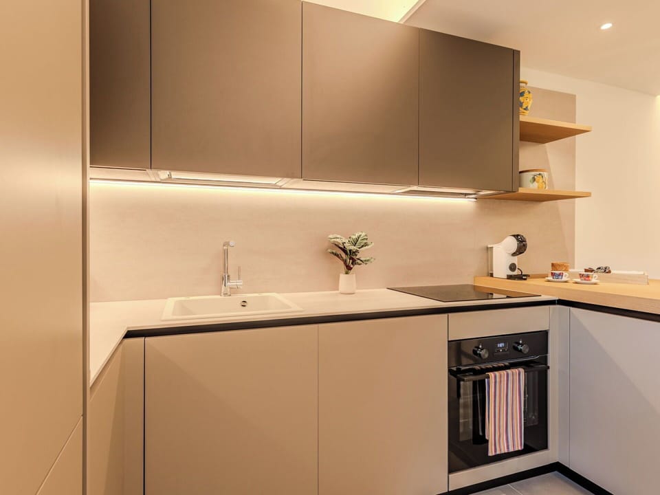 Kitchen, Countertop, Interior Design, Wood, Cabinetry, Kitchen Appliance, Furniture, Flooring, Light Fixture, Lighting