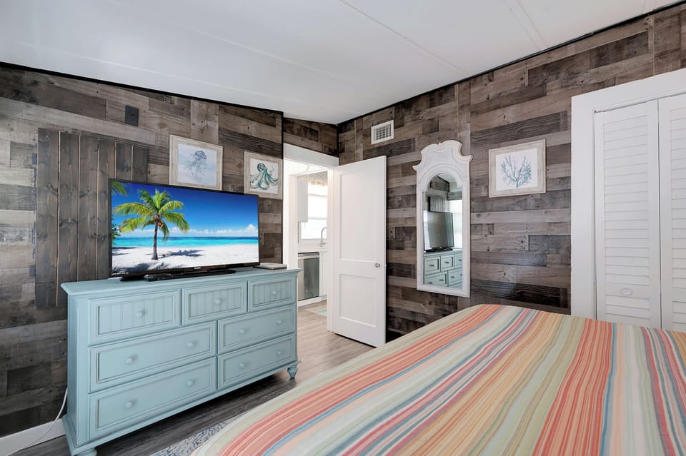 King bedroom with TV
