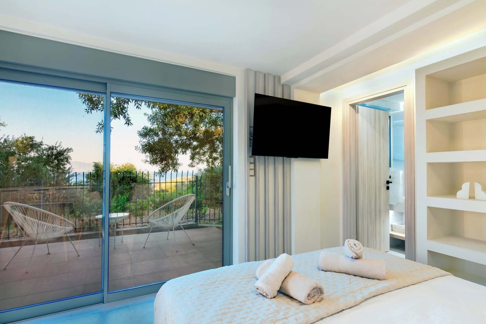 Bright Bedroom with Garden Views and Open Living Space