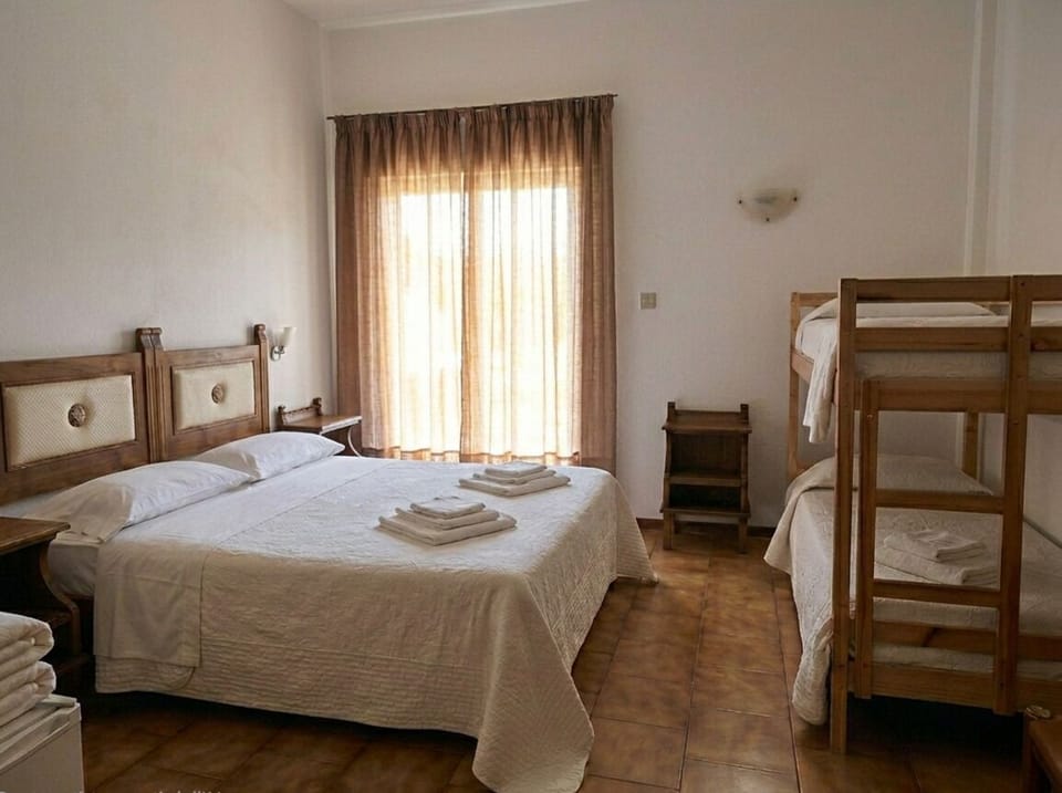 Quadruple Room | Bed sheets