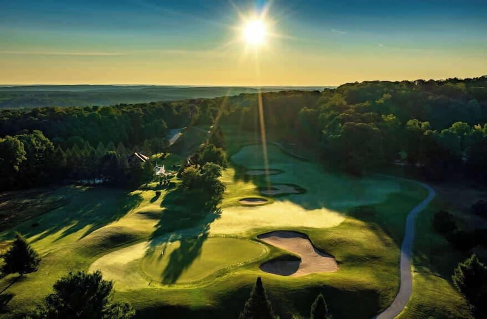 Two championship courses on property, tee times included