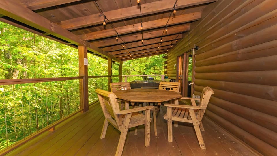 Dine al fresco on the spacious deck, surrounded by fresh mountain air and scenic views.