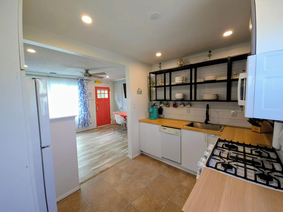 kitchen, fully equipped. microwave, gas range, keurig, dishwasher, refrigerator.