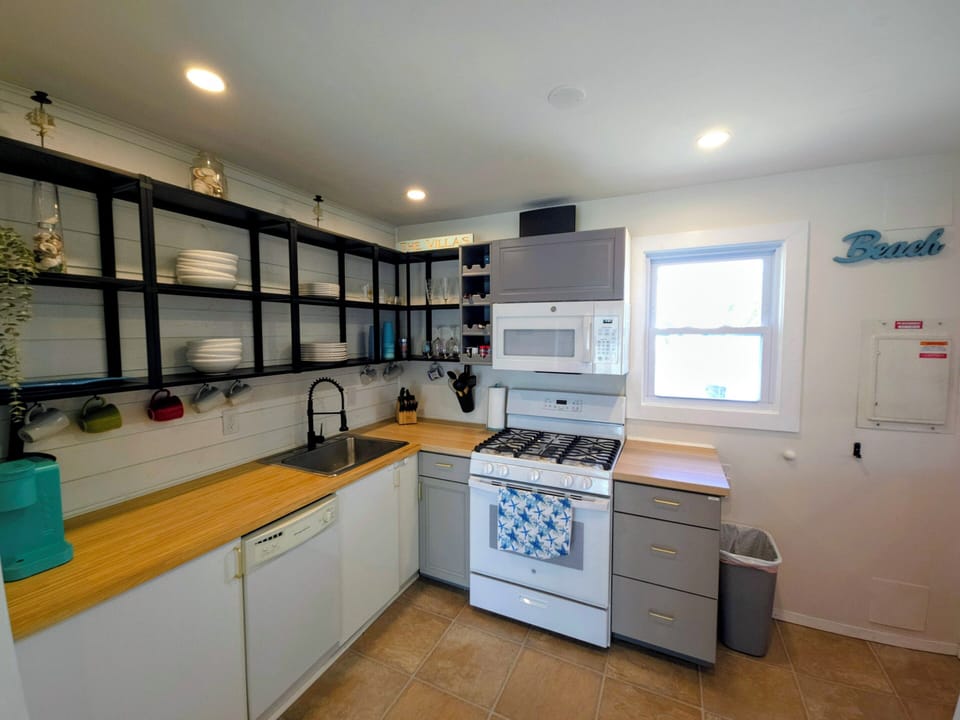 kitchen, fully equipped. microwave, gas range, keurig, dishwasher, refrigerator.
